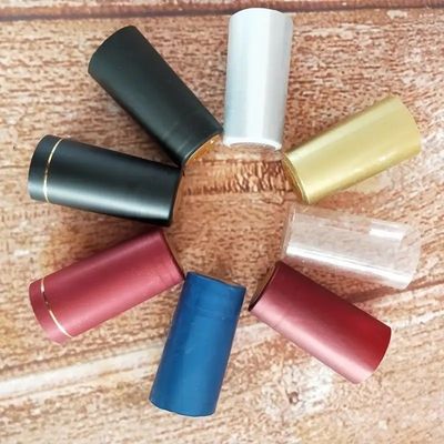 Capa de embalaje de botellas de vidrio con cinta de cuello de PVC personalizada para soluciones de embalaje de bebidas