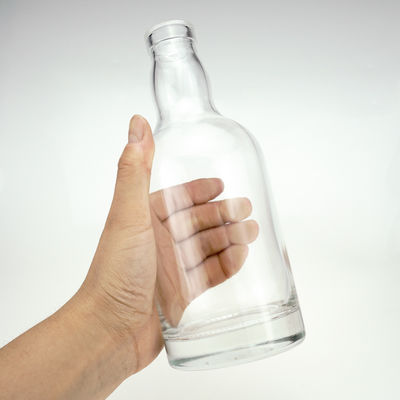 Cerraduras personalizadas de forma de logotipo 750ml Botella de vidrio única vacía para licor con tapa