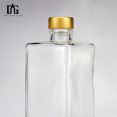 Botella de vidrio de vodka transparente de forma cuadrada de 750 ml con el logotipo del cliente aceptable
