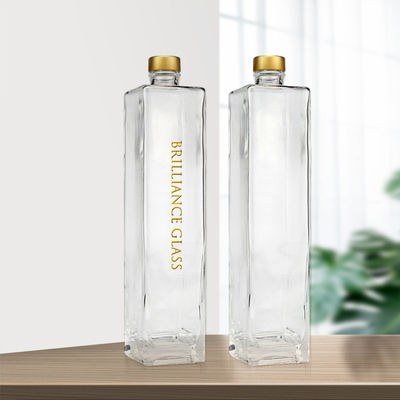 Botella de vidrio de vodka transparente de forma cuadrada de 750 ml con el logotipo del cliente aceptable