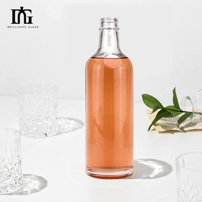 Acceptable OEM/ODM 550ml Botella de tapa de tornillo transparente para botella de vidrio de vino con alcohol de ginebra rum