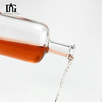 Botella de vidrio de sílex de 750 ml con diseño redondo clásico y cuello de vidrio