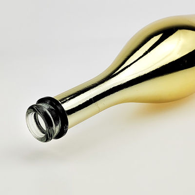 Botella de vidrio de champán de color oro con corcho para bebidas industriales