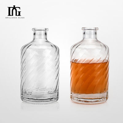 Logotipo del cliente aceptable botella de vidrio redonda clara personalizada para whisky brandy y ginebra
