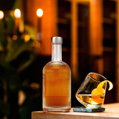 Tequila Diseño personalizado 330Ml Botella de vino de vidrio Botella de alcohol de vodka con sello de corcho