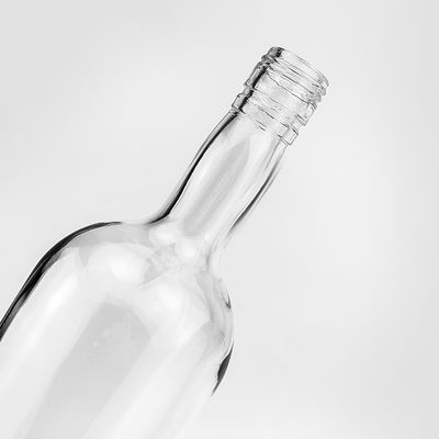 Botella vacía de bebida de vidrio de 750 ml para agua de licor material del cuerpo chino grabado de vidrio