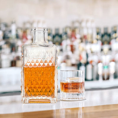 Collar de vidrio 700ml 750ml botella de licor personalizada con el logotipo del cliente aceptable