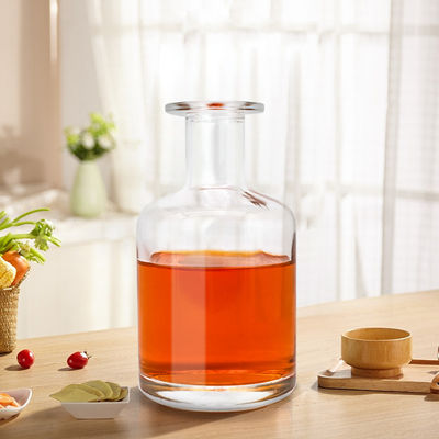 Etiqueta personalizada Botella de vidrio de 700 ml para whisky, vino, licor de piedra de vidrio de forma redonda