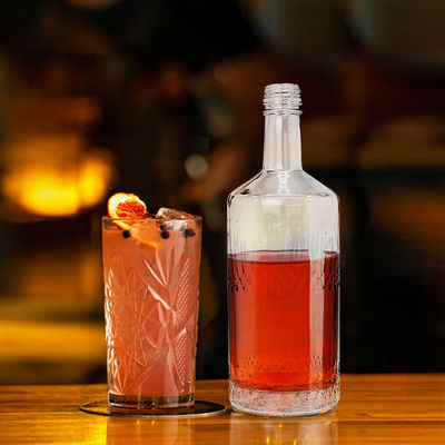 Botellas redondas de vidrio para bebidas de 500 ml para el sellado de licor Tipo CORK Aceptable OEM/ODM