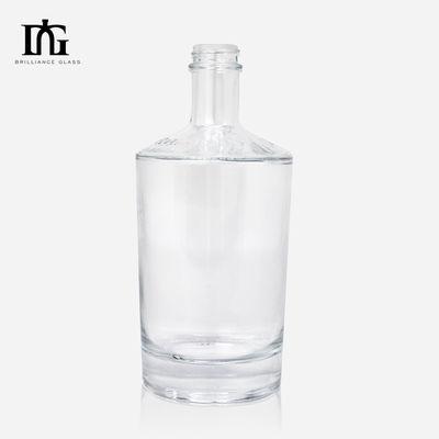 Botella de vidrio de fondo grueso para bebidas alcohólicas de lujo personalizada Gin whisky vodka tapa de tornillo
