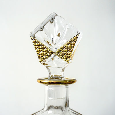 Botella de vidrio de whisky pesado de 500 ml/700 ml/750 ml de capacidad con el logotipo del cliente aceptable