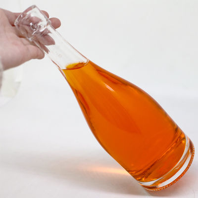 Personaliza botella de vidrio de 500 ml para brandy jugo vino licor espíritu OEM / ODM forma única