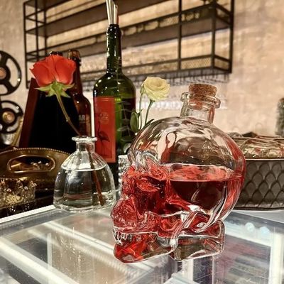 Botella de vidrio de cráneo para cerveza Impresión de pantalla Estampado en caliente Pintura grabado y más