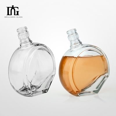 Botella especial de vidrio transparente de 50 cl con grabado para vodka whisky ginebra ron aceptable OEM / ODM