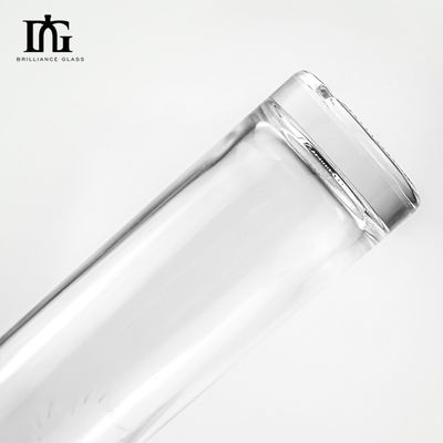 OEM/ODM aceptable Botella de vidrio de vodka de 750 ml con tapa de metal y tapa de tornillo de corcho