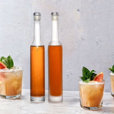 Botella redonda de vidrio de vodka de 350 ml con logotipo personalizado y sellado con corcho