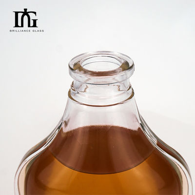 Botella de licor de vidrio transparente personalizada de 1000 ml Botella de vidrio de whisky con corcho y tapa de tornillo