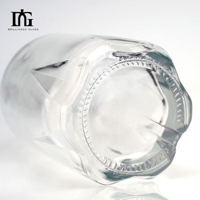 Grabación de la superficie de las botellas de vidrio manipuladas para el whisky en diferentes capacidades