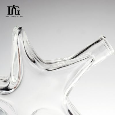 Contenedor de botellas de vidrio de 250 ml de grado alimenticio con tapa de tornillo de corcho en forma de estrella creativa