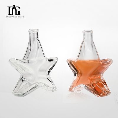 Contenedor de botellas de vidrio de 250 ml de grado alimenticio con tapa de tornillo de corcho en forma de estrella creativa