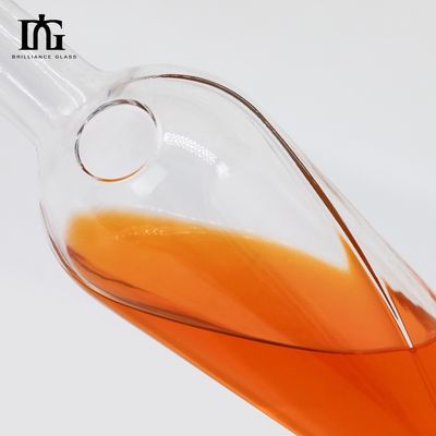 Botella de agua de vidrio con corcho y sellado de tapa de tornillo