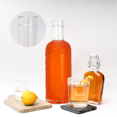 Botella de vidrio para bebidas con superficie de manipulación de la superficie de grabación ácida de 750 ml de capacidad y transparente