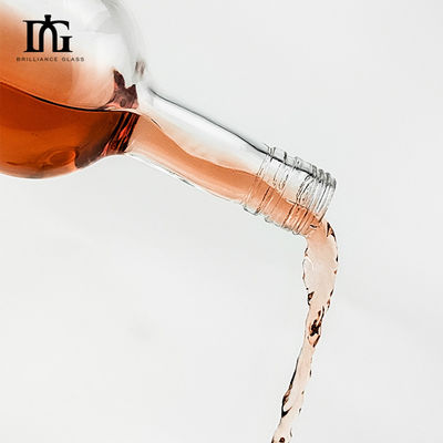 Botella de vidrio de vino de frutas redonda de 500 ml con tapa de tornillo e impresión de transferencia de calor